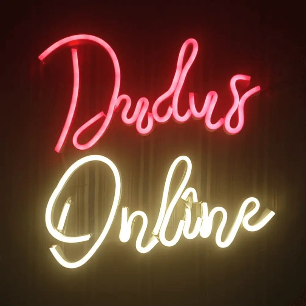 Logos in neon light at Dudus Online
